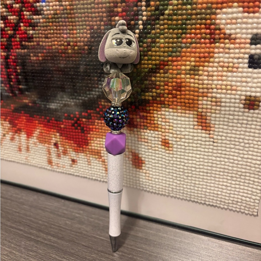 Decorative White and Purple Pen with flocked Eeyore topper